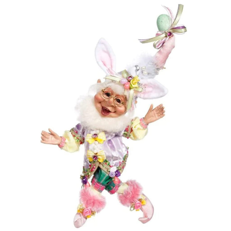Elf figurine dressed in a bunny outfit with bunny ears and a pointed hat with pink highlights