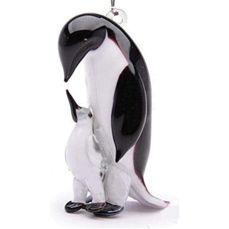 Father penguin looking down at baby glass figurine ornament.