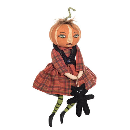 Fabric doll figurine with a pumpkin head, and an orange plaid dress. she's holding a black felt cat 