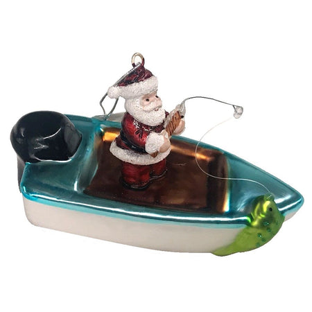Power boat shaped Christmas ornament.  Shows Santa fishing from boat with a fish on the line.