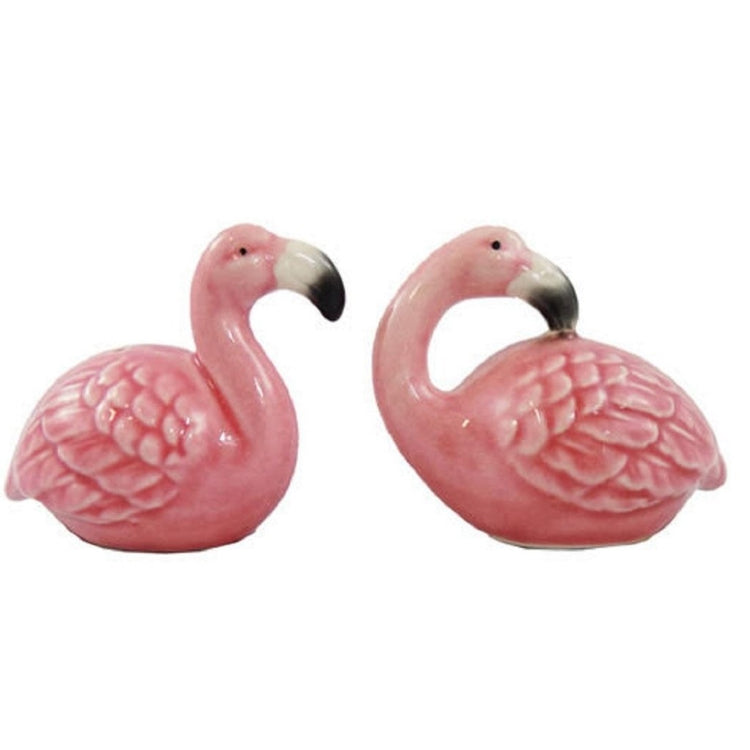 Pink flaming shaped salt and pepper shakers.  Sitting flamingos.