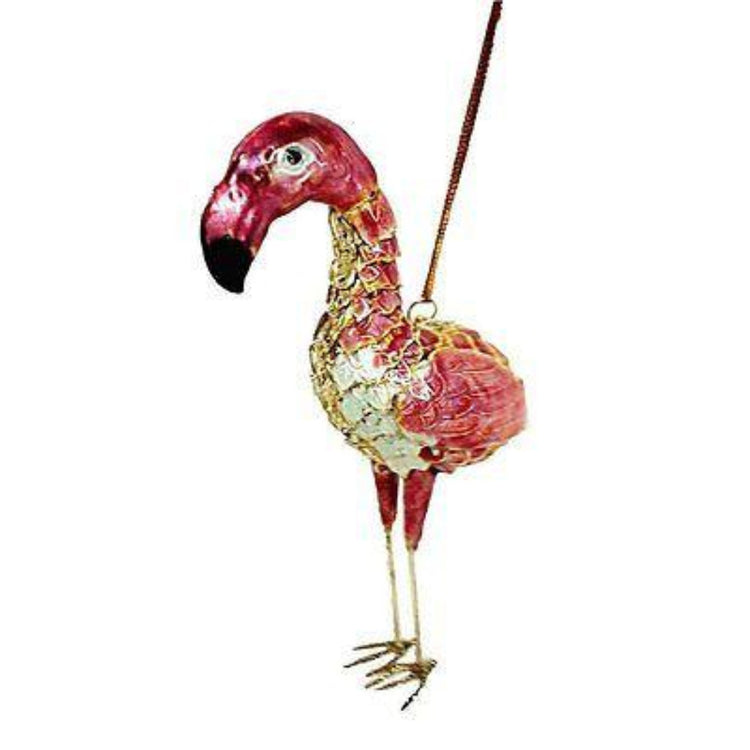 Pink flamingo shaped hanging Christmas ornament with gold metal accent.