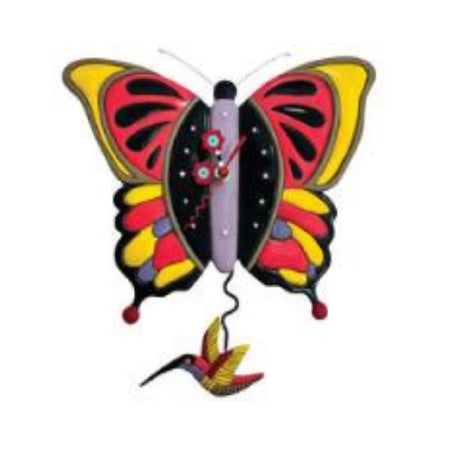 resin butterfly clock, pink, yellow, purple and black with hummingbird pendulum.