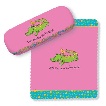 Pink case with a green alligator and a yellow bird on it. Saying is 'Love the one you're with".