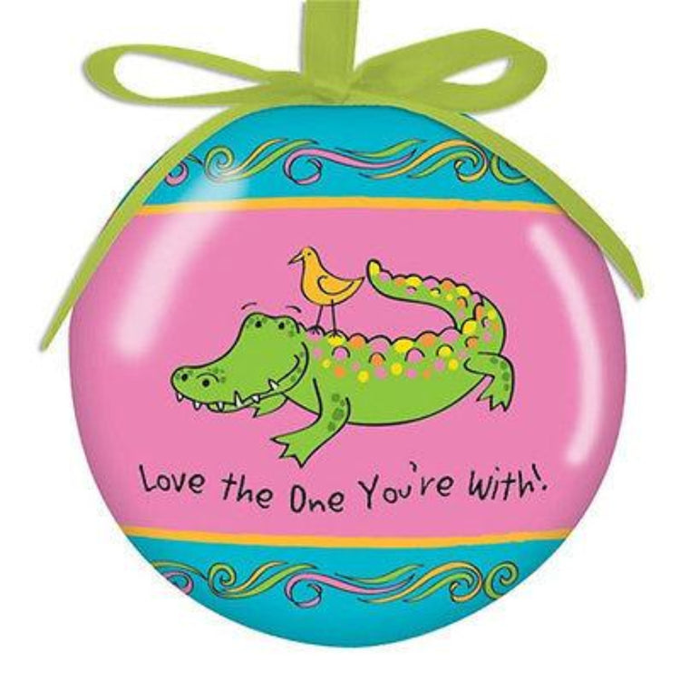 Round Hanging Christmas Ornament with green ribbon cord.  Teal and Pink with alligator and yellow bird.