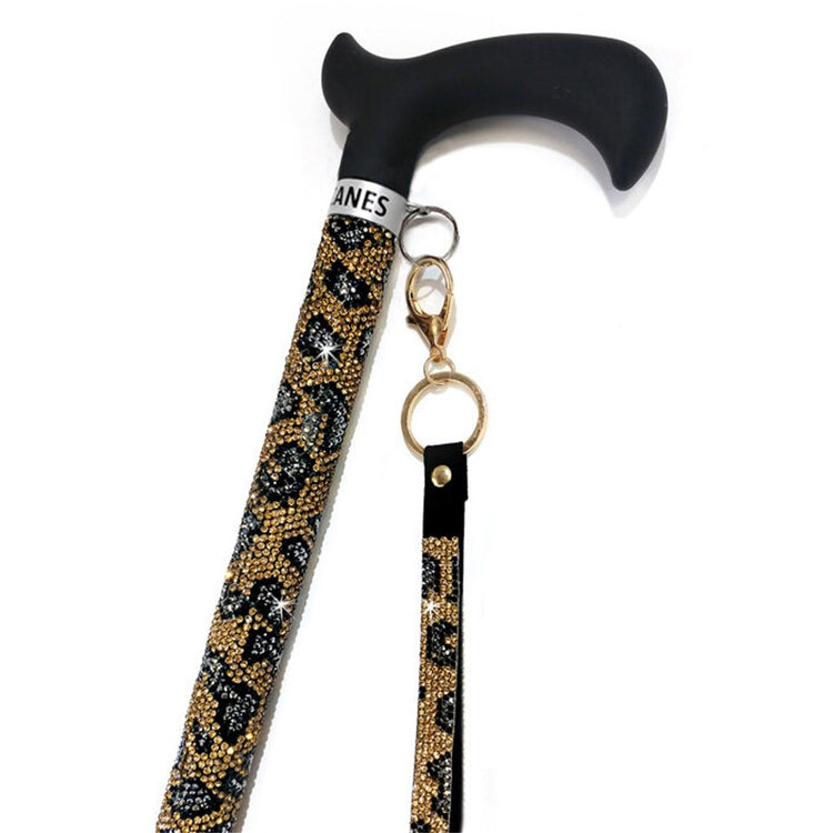 Beaded cane with attached wristlet.  Golden Leopard design.