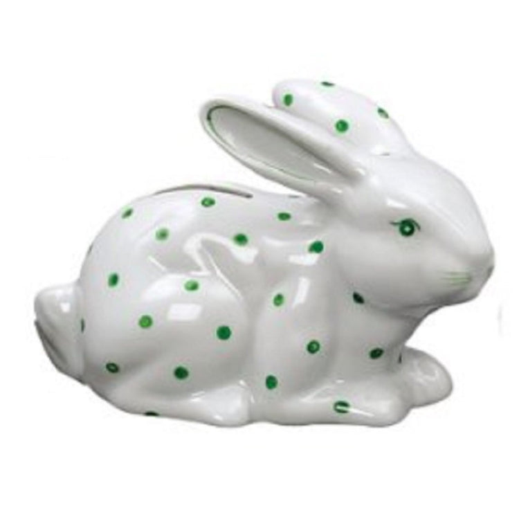 Laying white rabbit bank with green spots, eye and whiskers. Coin slot on back.