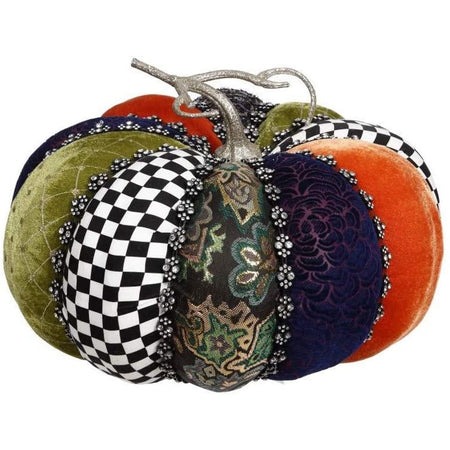 fabric pumpkin with multiple colored panels separated by rhinestones.