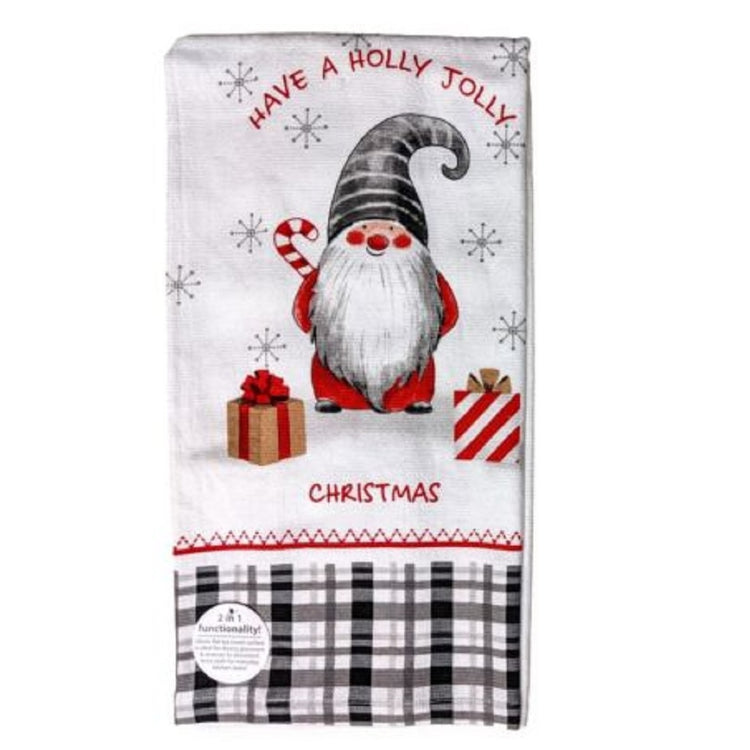 White terry cloth towel with a holiday gnome holding a candy cane, the phrase "Have a Holly Jolly Christmas"  and a grey and black plaid on the bottom of the towel.