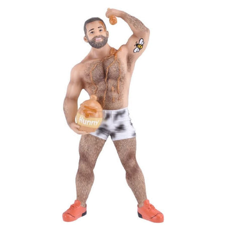 resin "bear" man wearing small white shorts, orange sneakers and dripping honey on himself.