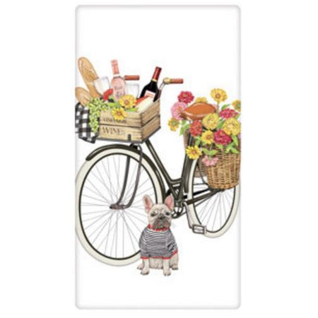 French bulldog with a bike with wine & flowers in it.