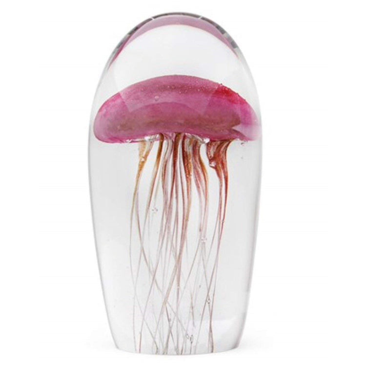Clear glass paperweight with encased pink jellyfish figure.