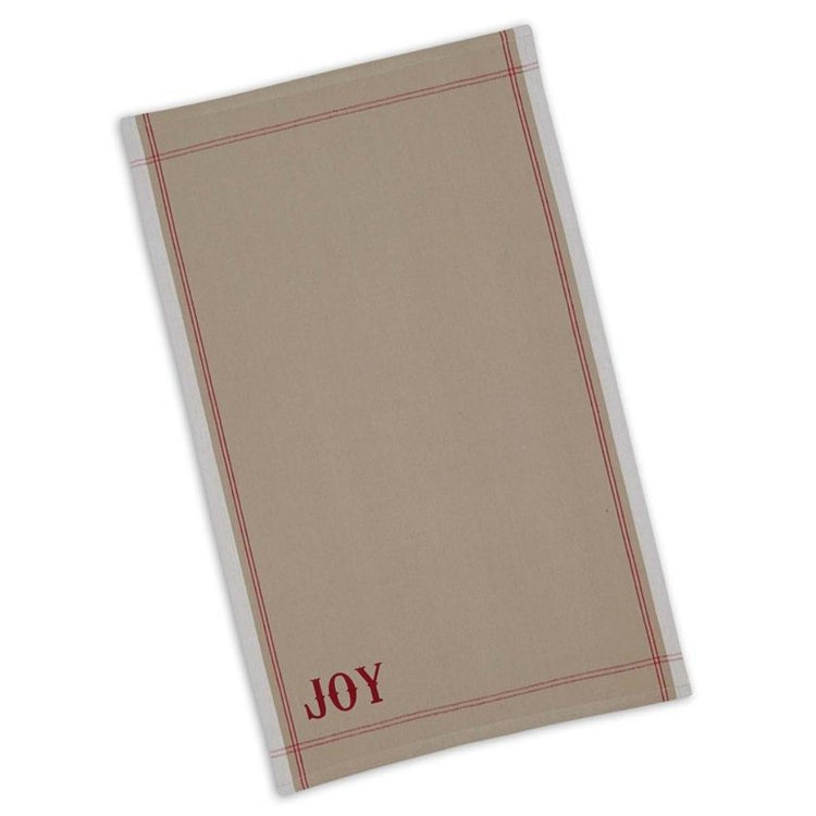 Tan kitchen towel with saying 'joy' in the bottom left corner.