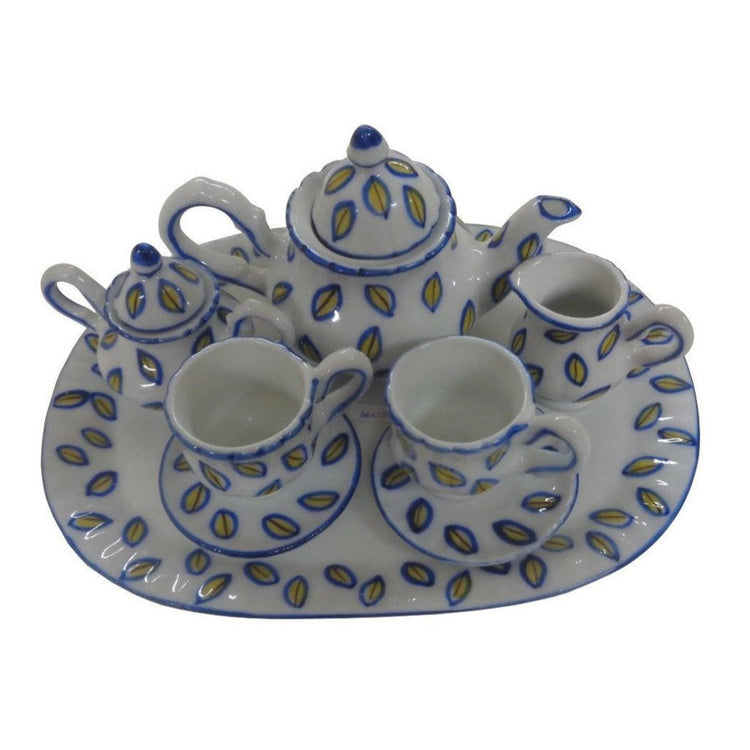 Tea set for 2.  Yellow flowers on white on teapot, sugar, creamer, 2 cups and saucers and tray.