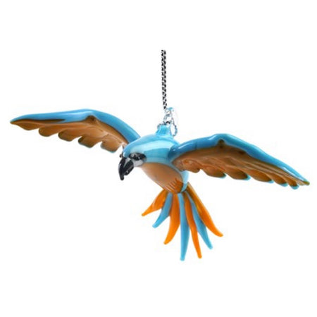 blue and gold macaw ornament with wings open as if it is flying