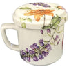 white mug with lid with a rose on it