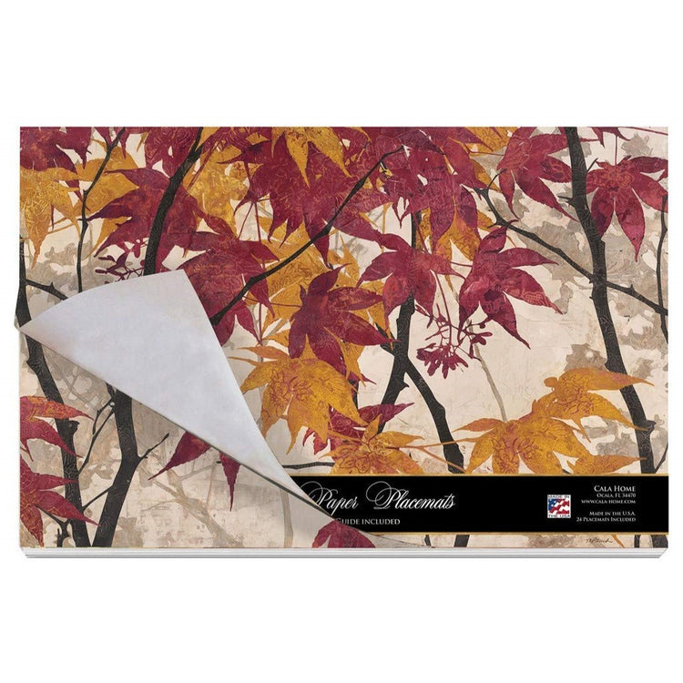 Paper placemats with a tan background and red, orange and brown fall maple leaves design