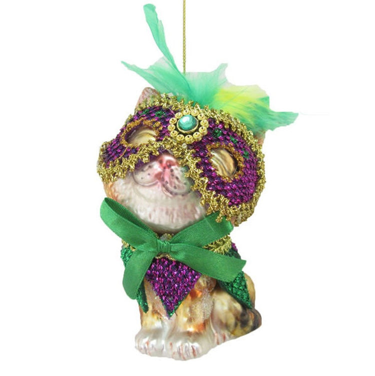 Cat shaped figurine ornament.  Embellished purple and gold mask with green ribbons.