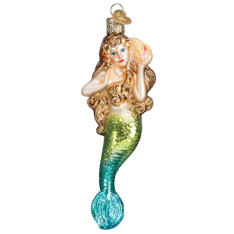 Mermaid ornament holding a shell to her ear. shades of gold for the top half with greens and blues toward the bottom.