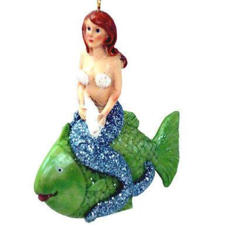 Mermaid riding a tropical fish figurine ornament.