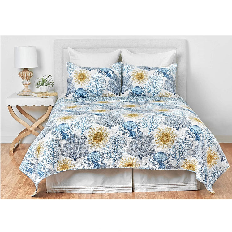Off white comforter with blue sea life such as fn coral and jellyfish and gold fan coral accented throughout.  Shams is same print.
