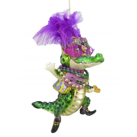 Male crocodile figurine ornament in gold and green holding a guitar with Mardi Gras beads.