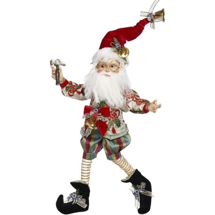 Tall elf with white beard, glasses, striped pants, black boots and a red hat.