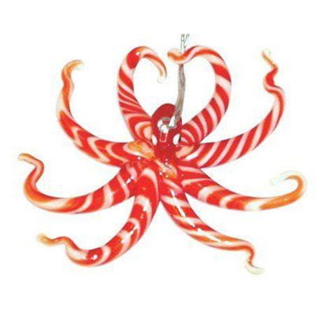 Red & white striped octopus with its legs up.