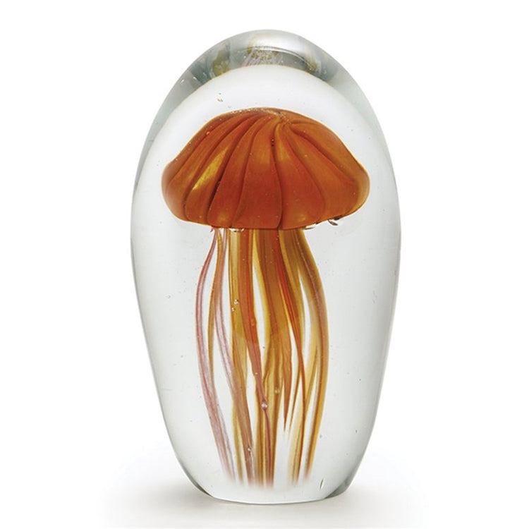 Clear orange jellyfish in a clear glass dome. Body of jellyfish at the top with legs going down.