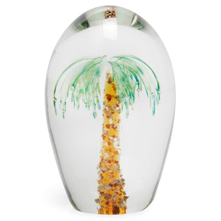 Clear glass paperweight with Palm tree decor encased within.