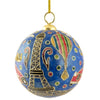 Alternate view of round Christmas ball with raised enamel. Shows Eiffel Tower and a hot air balloon.