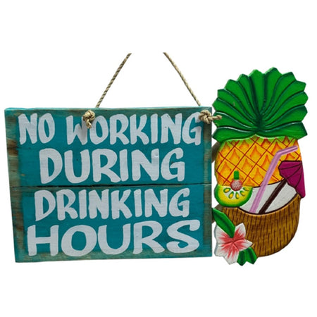 Wooden sign with teal back that says 'No working during drinking hours'. Has a fruity drink attached. 