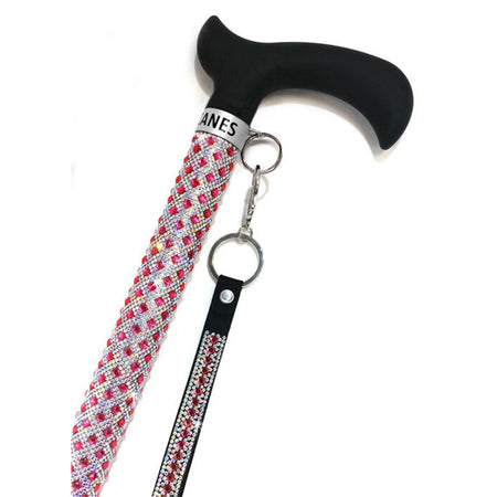 Beaded cane with attached wristlet.  Pink beads and silver.