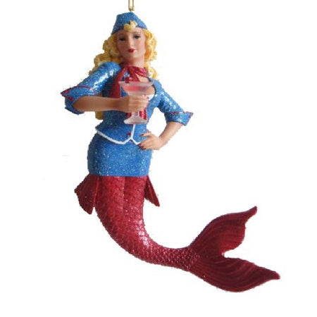 Regina mermaid has long blonde curly hair and is dressed in a blue flight attendant outfit, with a red tail.