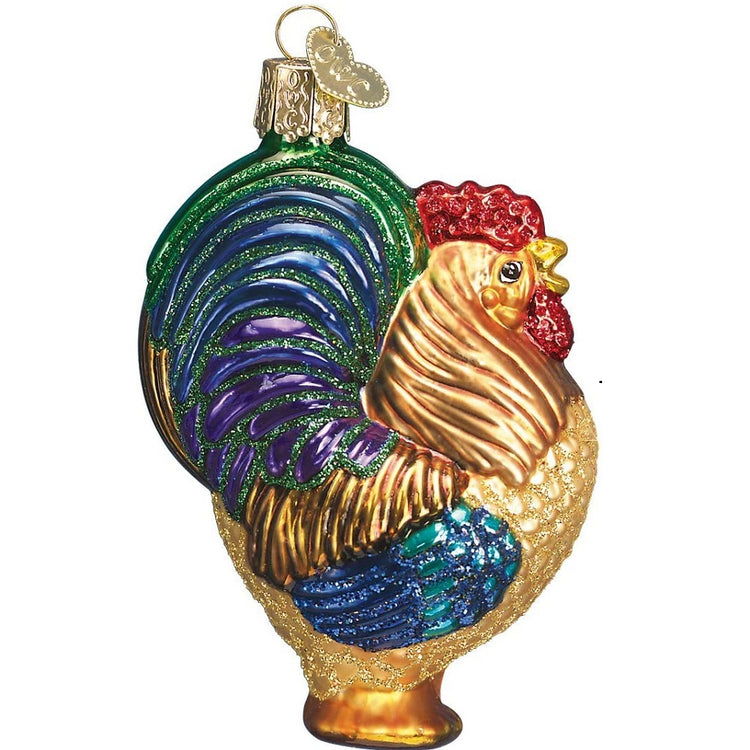 Side view of a colorful rooster ornament. The body is gold with glue and green feathers and a red crop.  Sparkle finish all over.
