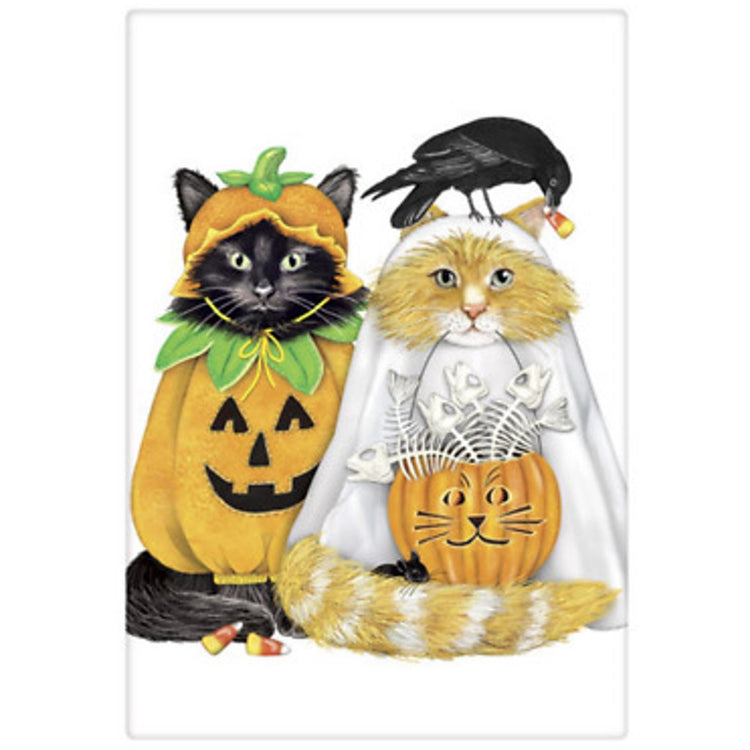 white towel with two cats, black cat dressed in a pumpkin costume and orange cat in ghost costume.