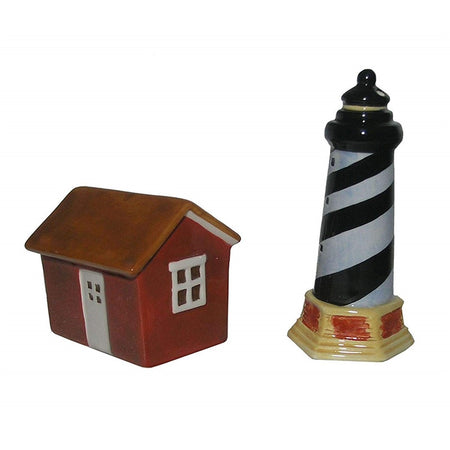 Black and white striped lighthouse with a red house salt & pepper shaker set.