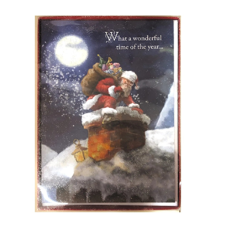 Box of Christmas cards. Card has image of Santa climbing in a chimney on a snow covered roof. Also says "What a wonderful time of the year."