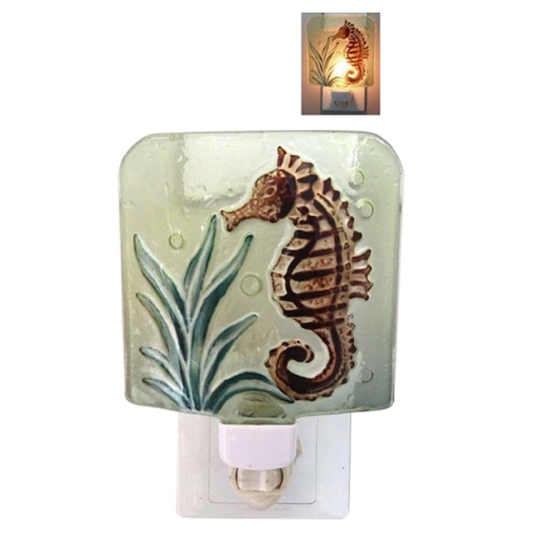 square shaped glass night light cover w/brown seahorse & green plant, on/off switch under cover. small image with light on.