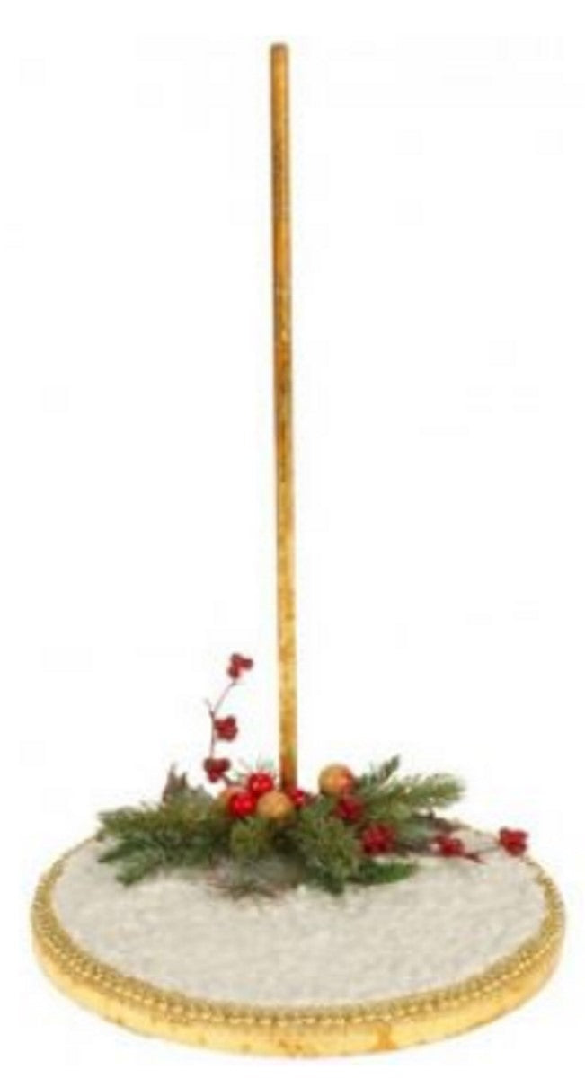 White snow decoration on round stand with holly accent and gold trim.