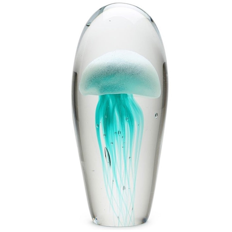 blown glass turquoise glow in the dark jellyfish paperweight.