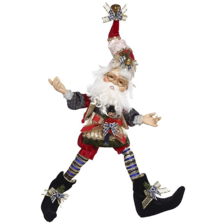 Tall elf with white beard and glasses, blue red black and gold colored clothing
