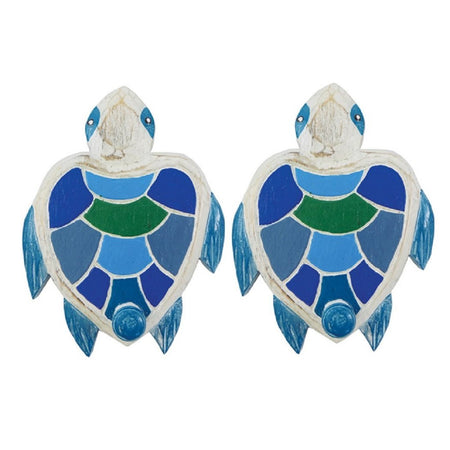 2 wood turtle design wall hooks. The turtles are white with blue fins & shells that are different shades of blue & green