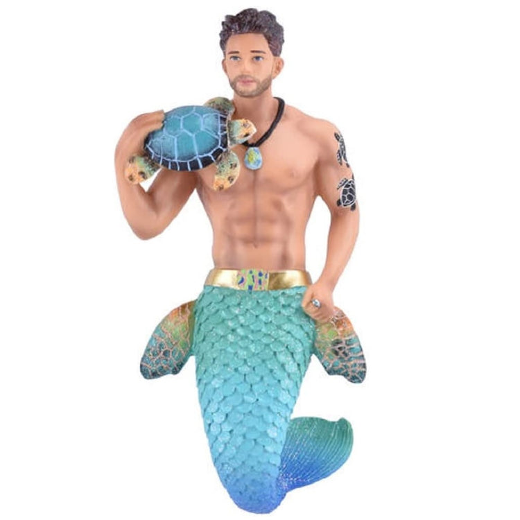 merman ornament with teal tail, and turtle flippers, holding a turtle 