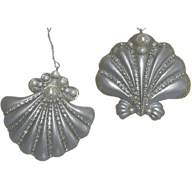 Silver shell ornament with pearl and rhinestone embellishments.