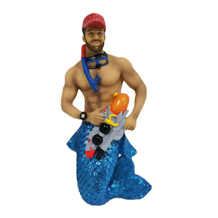Merman with brown hair & beard wearing red baseball cap, snorkel & goggles. He has a blue tail and is holding a water gun.