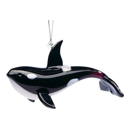 Glass Orca ornament swimming with tail down. Black with white belly and spots. Hanger is on back fin.