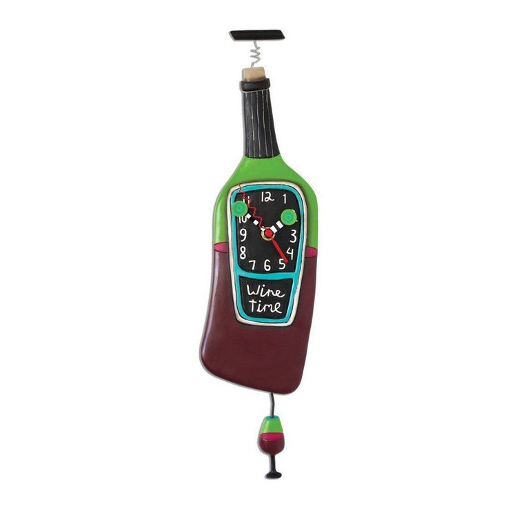 Wine bottle shaped clock. Wine bottle looks half full, has a cork popping out and a wine glass pendulum. 