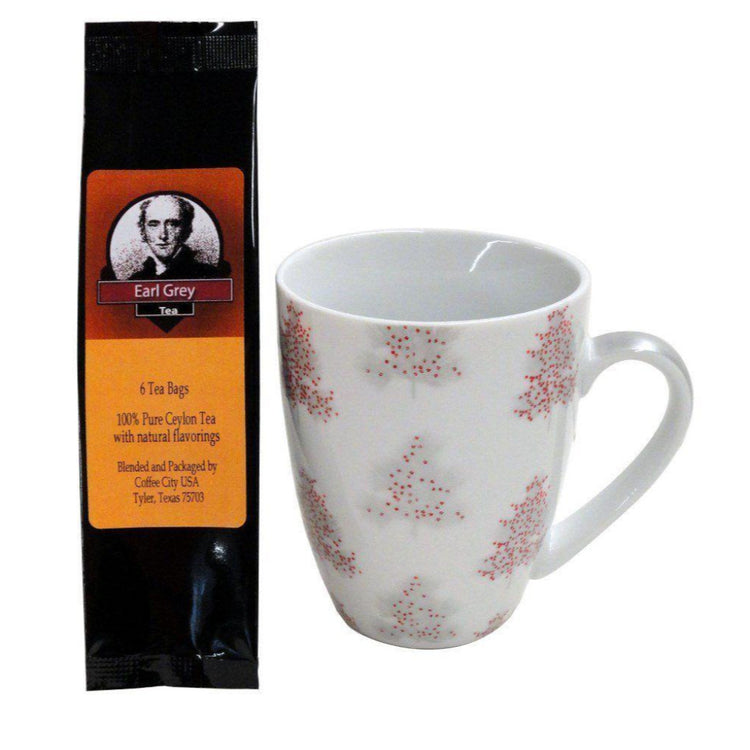 White mug imprinted Christmas trees decorated red. Earl Grey tea package.