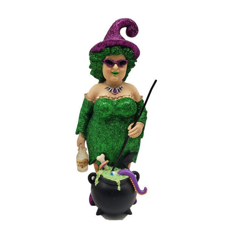 Witch with glittery green hair and dress, glittery purple witches hat, couldron with potion and a potion bottle.